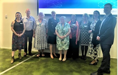 A group of people at a conference centre